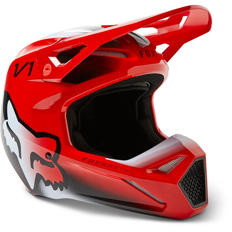 Casque cross FOX V1 TOXSYK rouge fluo avec visière et coque moulée