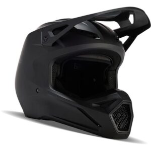 Casque cross FOX Youth V1 noir mat avec visière réglable et MIPS®.
