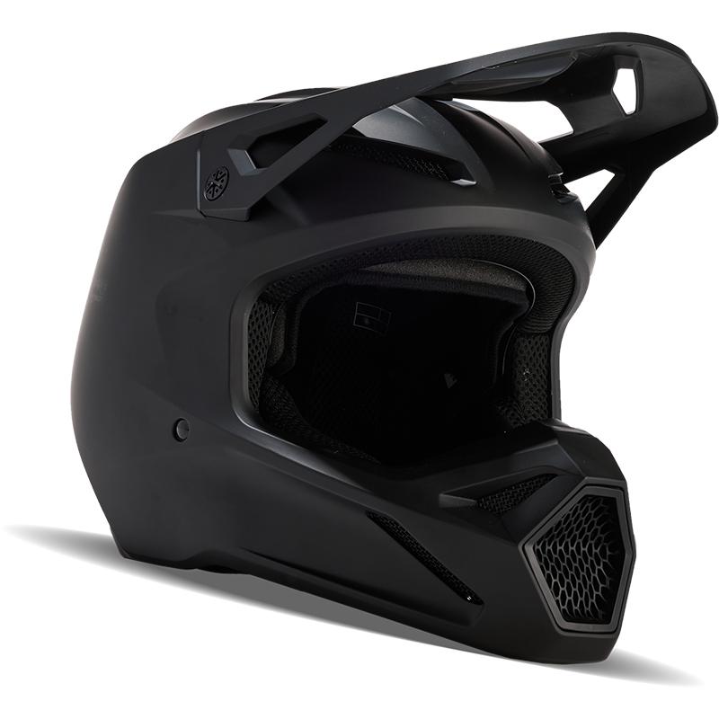 Casque cross FOX Youth V1 noir mat avec visière réglable et MIPS®.